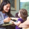 jennifer-espronceda-shaking-hands-with-a-child